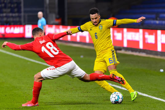 Alexander Bah of Denmark and Martin Olsson of Sweden