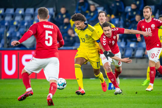 Jens-Lys Cajuste of Sweden and Thomas Delaney and Joakim