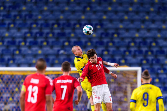 Sebastian Holmén of Sweden and Jonas Wind of Denmark