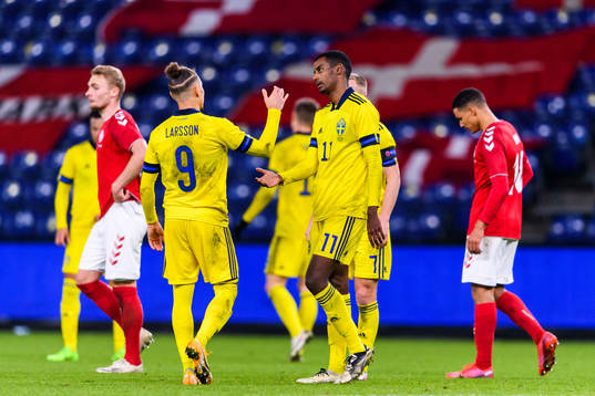 Jordan Larsson and Alexander Isak of Sweden look dejected
