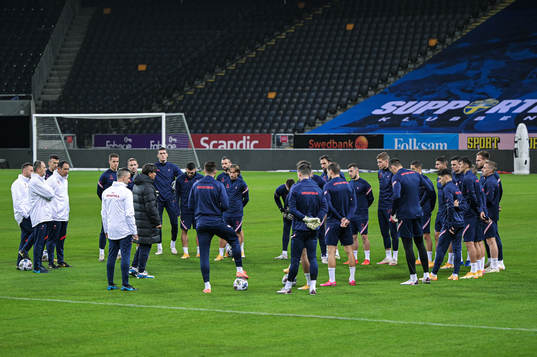 Players of the Croatian national football team listening to