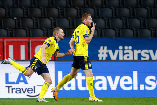 Sebastian Larsson and Dejan Kulusevski of Sweden celebrate