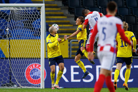 Ivan Perisic of Croatia scores the 2-1 goal behind Marcus