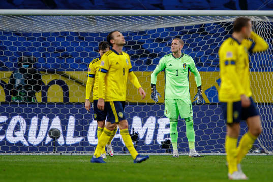 Goalkeeper Robin Olsen of Sweden looks dejected