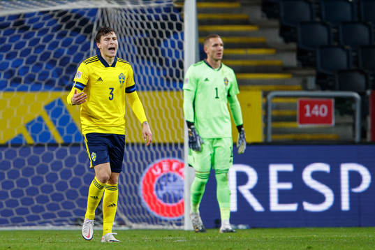 Victor Nilsson Lindelöf and goalkeeper Robin Olsen of