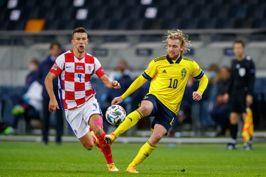 Ivan Perisic of Croatia and Emil Forsberg of Sweden