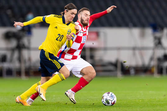 Kristoffer Olsson of Sweden and Nikola Vlasic of Croatia