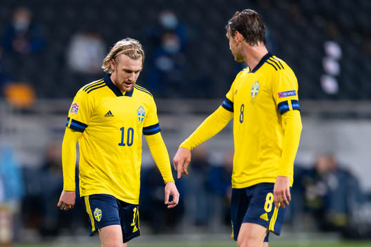 Emil Forsberg and Albin Ekdal look dejected