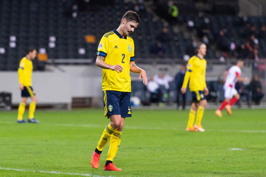Mikael Lustig of Sweden looks dejected