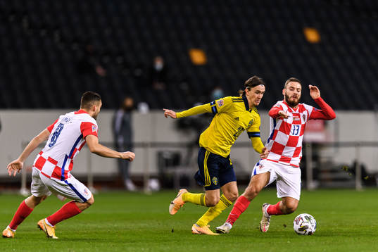 Mateo Kovacic and Nikola Vlasic of Croatia against