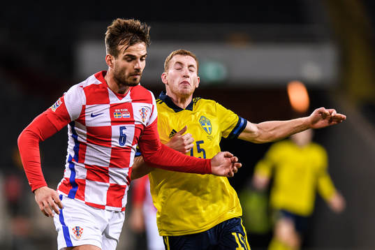 Marin Pongracic of Croatia and Dejan Kulusevski of Sweden