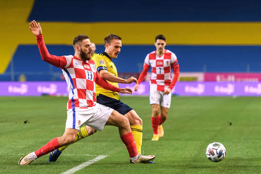 Nikola Vlasic of Croatia and Pierre Bengtsson of Sweden
