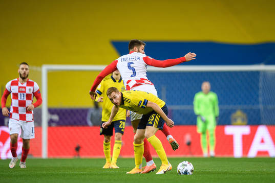 Dejan Kulusevski of Sweden and Duje Caleta-Car of Croatia
