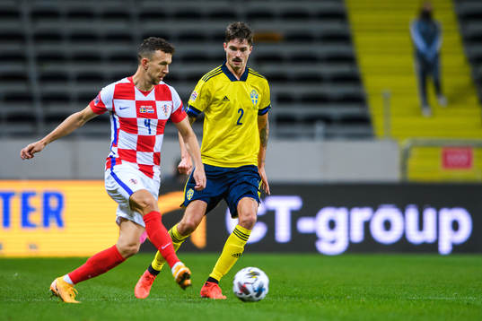 Ivan Perisic of Croatia and Mikael Lustig of Sweden