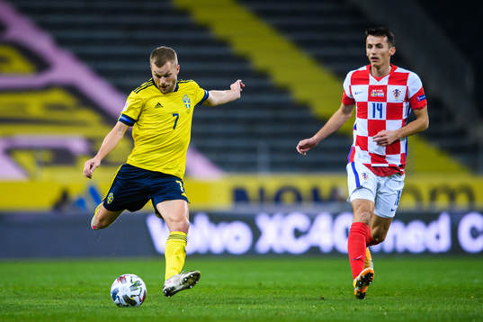 Sebastian Larsson of Sweden and Ante Budimir of Croatia