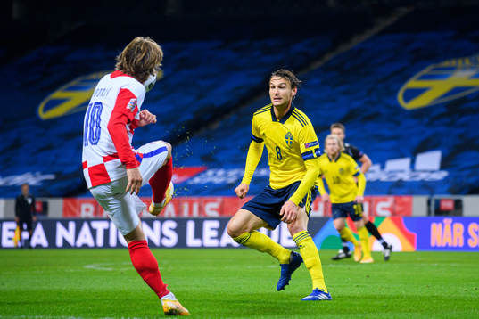 Luka Modric of Croatia and Albin Ekdal of Sweden