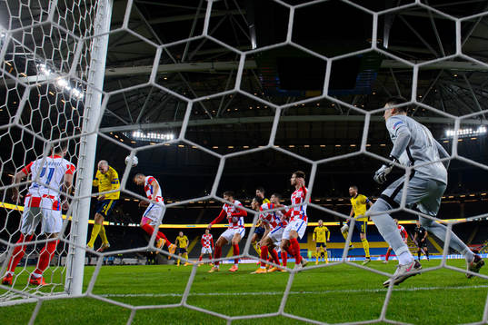Marcus Danielson of Sweden scores the 2-0 goal behind