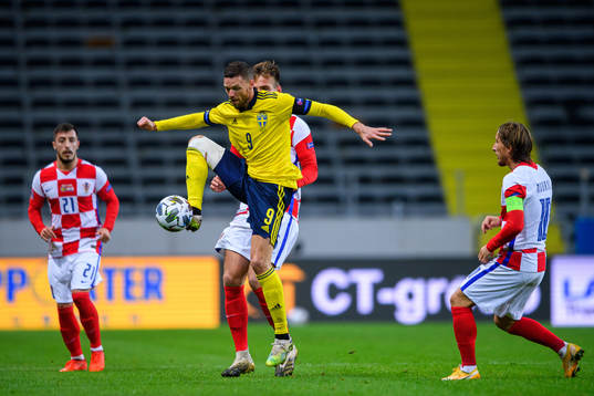 Marcus Berg of Sweden against Marin Pongracic,  Josip