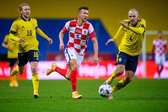 Ivan Perisic of Croatia against Emil Forsberg and Marcus