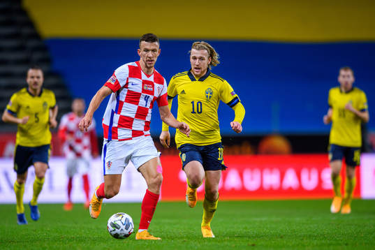 Ivan Perisic of Croatia and Emil Forsberg of Sweden