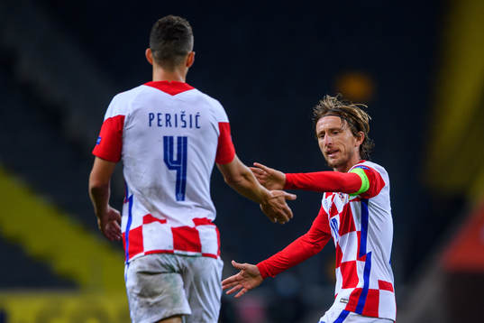 Ivan Perisic and Luka Modric of Croatia celebrate the 2-1