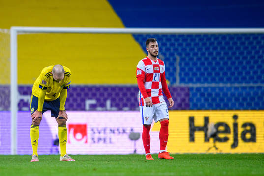 Marcus Danielson of Sweden and Josip Juranovic of Croatia