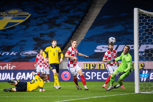Ivan Perisic of Croatia not in picture scores 2-1 behind