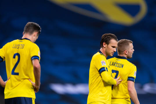Mikael Lustig, Albin Ekdal and Sebastian Larsson of Sweden