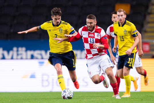 Mikael Lustig of Sweden and Nikola Vlasic of Croatia
