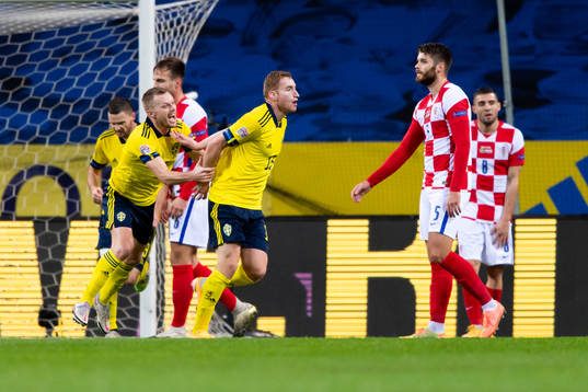 Sebastian Larsson and Dejan Kulusevski of Sweden celebrate