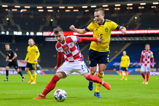 Josip Juranovic of Croatia and Pierre Bengtsson of Sweden