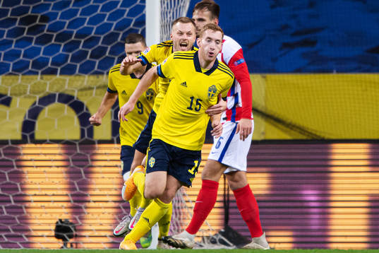 Sebastian Larsson and Dejan Kulusevski of Sweden celebrate