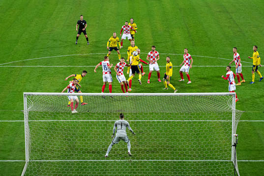 Marcus Danielson of Sweden with a header