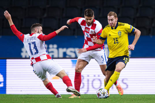 Nikola Vlasic and Duje Caleta-Car of Croatia in action