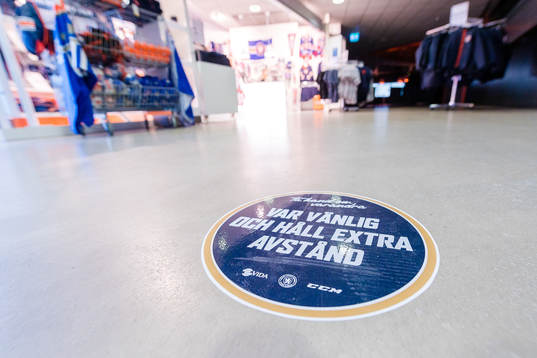 Information om att hålla avstånd på golvet i Vida arena