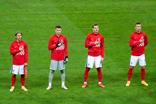 Luka Modric, goalkeeper Dominik Livakovic, Boma Barisic and