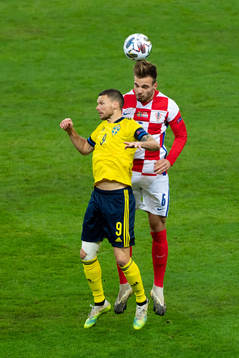 Marcus Berg of Sweden and Marin Pongracic of Croatia