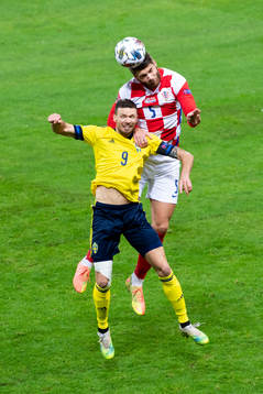 Marcus Berg of Sweden and Duje Caleta-Car of Croatia