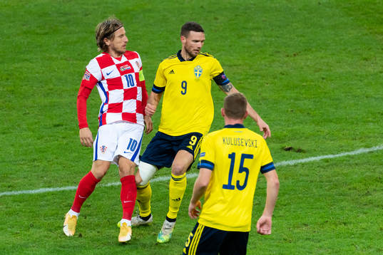 Luka Modric of Croatia and Marcus Berg of Sweden