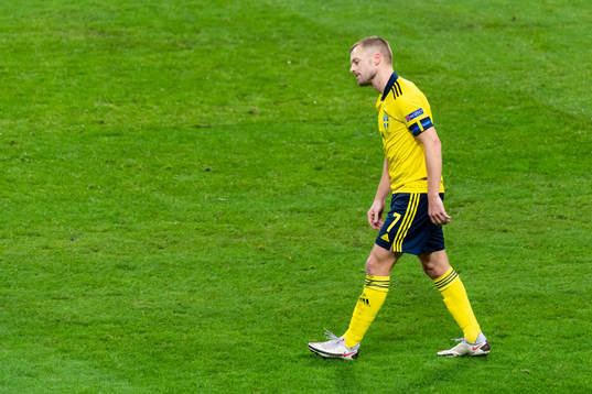 Sebastian Larsson of Sweden looks dejected