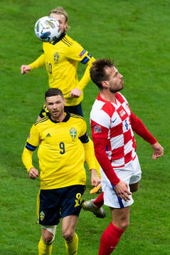 Marcus Berg of Sweden and Marin Pongracic of Croatia