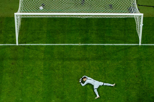 goalkeeper Dominik Livakovic of Croatia looks dejected