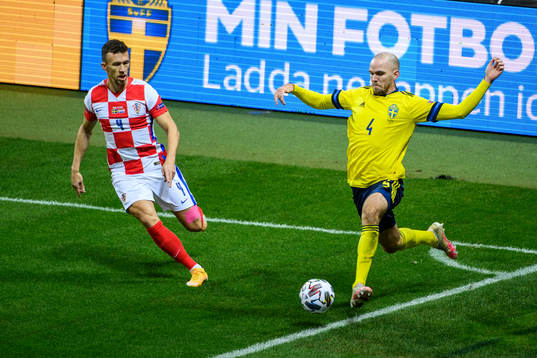 Ivan Perisic of Croatia and Marcus Danielson of Sweden