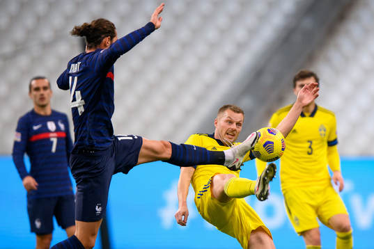 Adrien Rabiot of France and Sebastian Larsson of Sweden