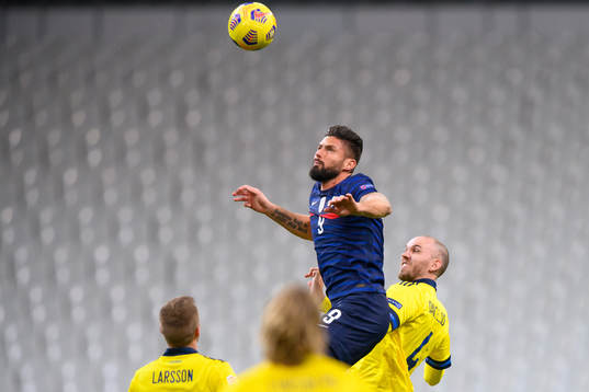 Olivier Giroud of France and Marcus Danielson of Sweden