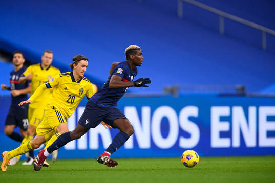 Kristoffer Olsson of Sweden and Paul Pogba of France