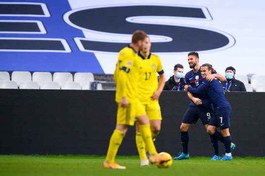 Olivier Giroud and Antoine Griezmann of France celebrate