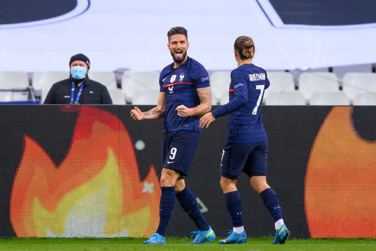 Olivier Giroud and Antoine Griezmann of France celebrate