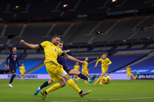 Marcus Berg of Sweden and Lucas Digne of France