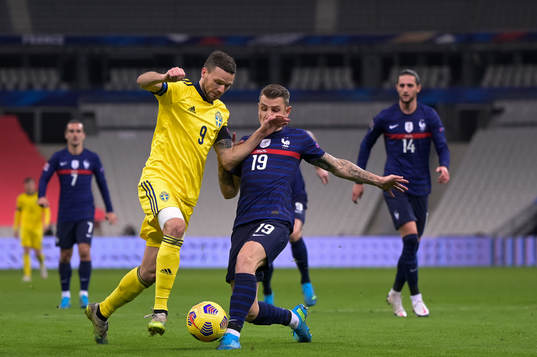 Marcus Berg of Sweden and Lucas Digne of France